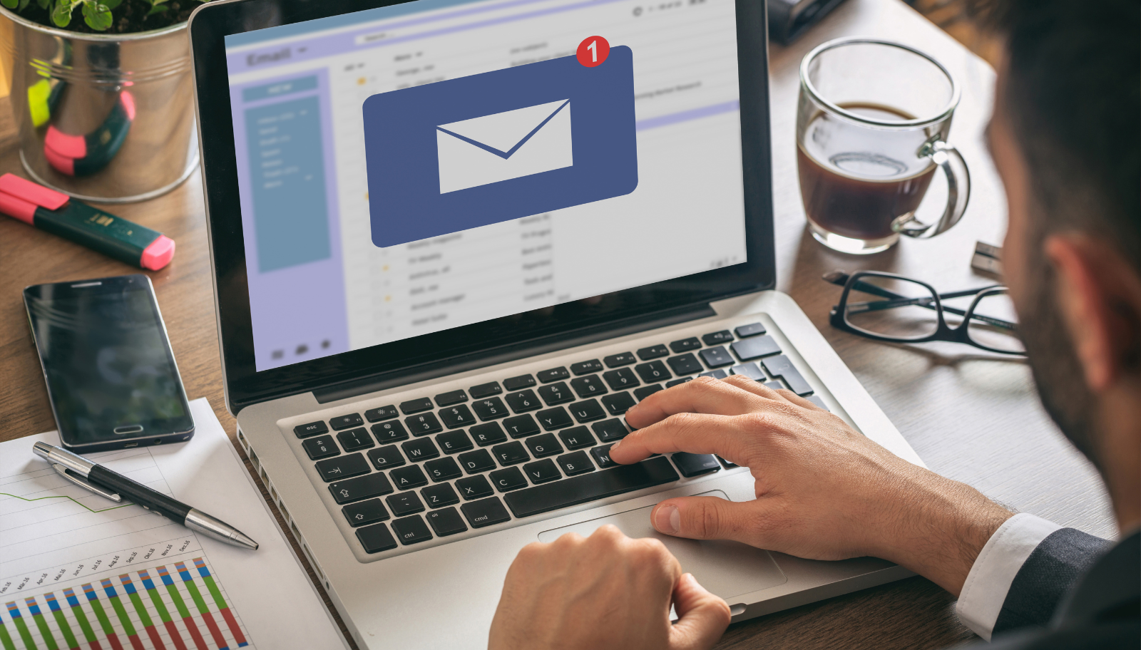 Reviewing a drafted follow-up email on a laptop